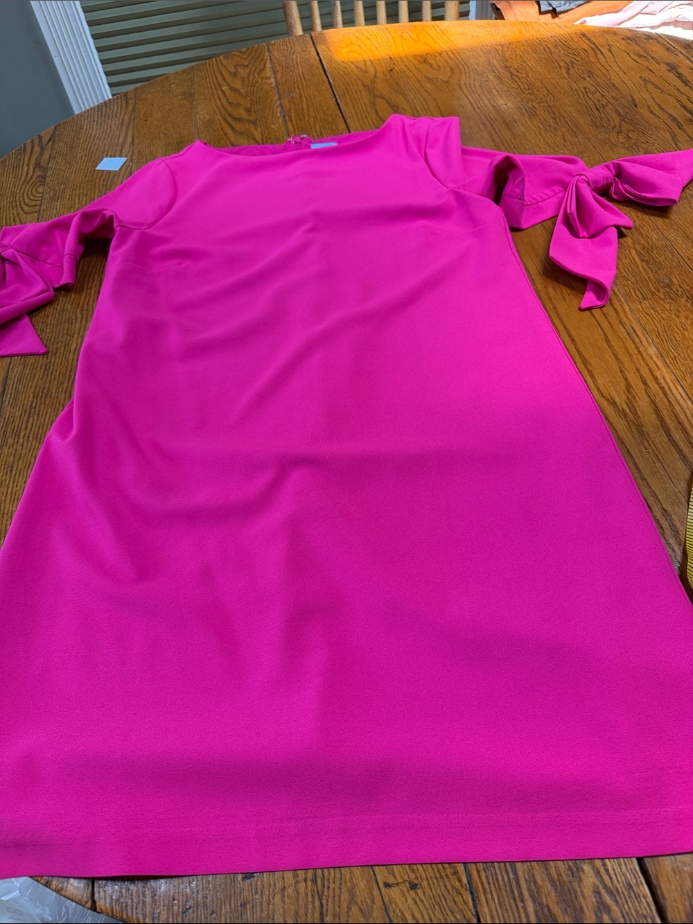 CeCe crepe shift dress in hot magenta.  Fully lined. Bows on sleeves. Size 10.